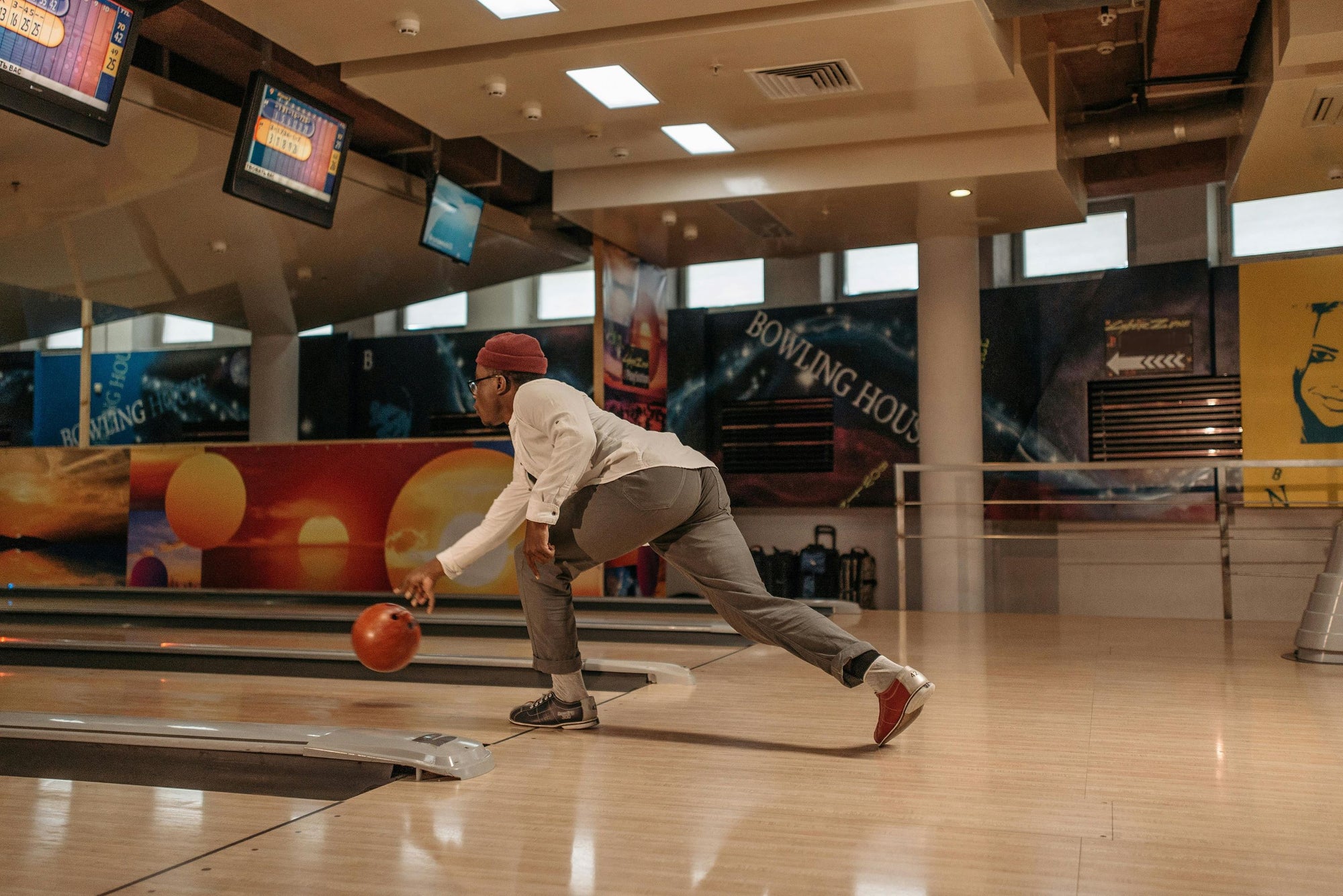 Action shot of a person throwing a ball right after release